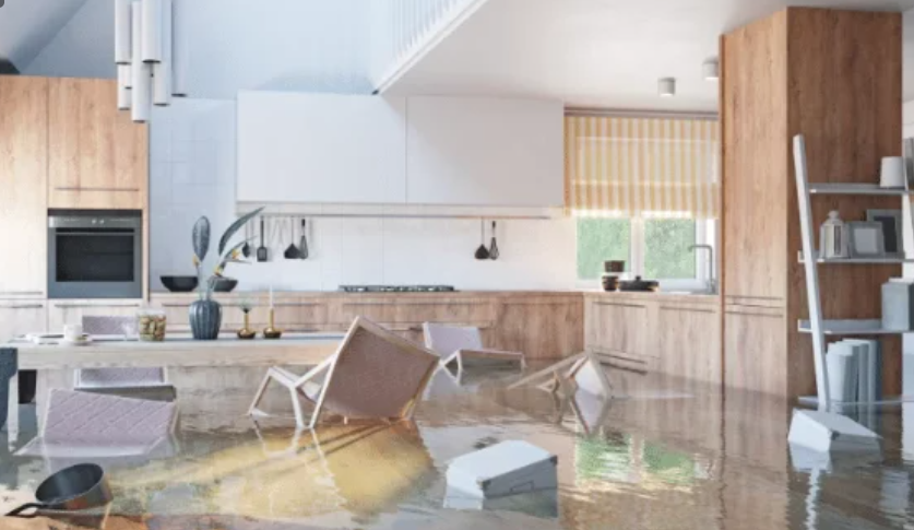 A flooded room after a burst pipe